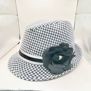Stylish Black and White Houndstooth Fedora with Flower Accent